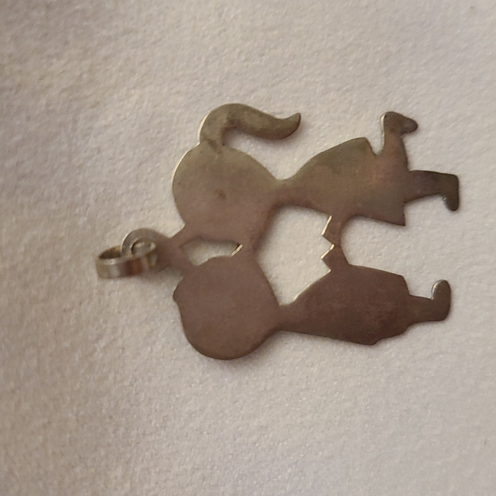 Silver pendant from Peru